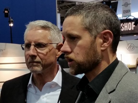 Adam Weatherby, right, accepts the leadership of the company from his father, Ed.