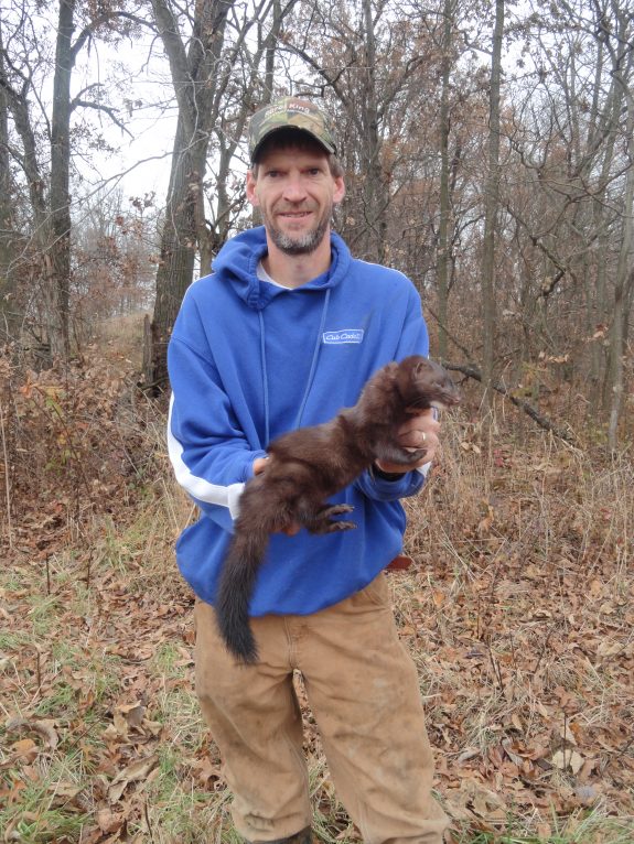 Jason Houser with a nice mink taken using the Bottom Edge Set