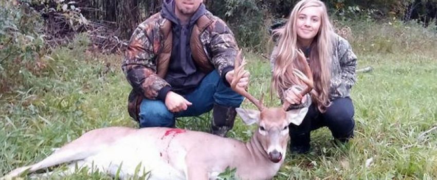 Brian Ellison of Rockford Michigan with his daughter, 15, and 10-point buck.