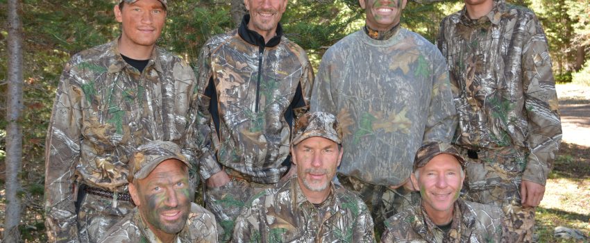 The Larson family pauses for a portrait before heading out into the mountains.
