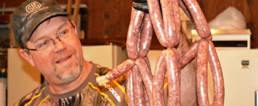 Brad Fenson proudly displays our first batch of venison hotdogs.