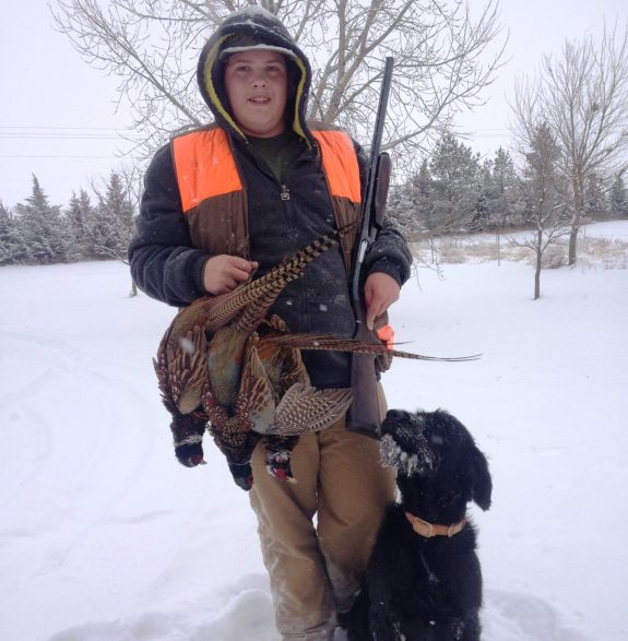 Tim lives in Central South Dakota and has taken two limits of pheasants in the past two days.  Note the icy whiskers on the dog.